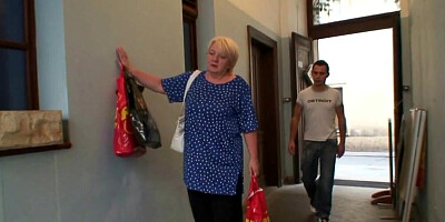 Tubby granny easily seduces a guy with her helpless curves