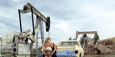 Horny couple is having sexual interaction outdoors