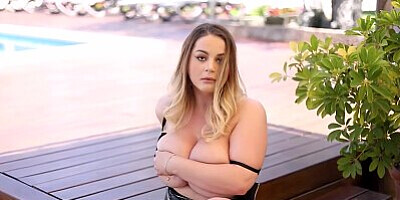 Enjoy staring at Holly Garden enormous boobs while she uncovers