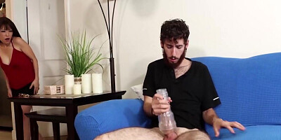 Busty Asian MILF Nami Lee is using a toy on his dick