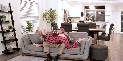 Dude in a weird Christmas sweater has casual sex on the couch
