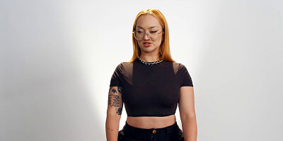 Redhead cougar gets naked and plays with wet pussy