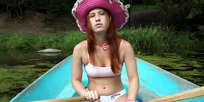 Redhead girl Nika Nut is playing with her pussy on the boat