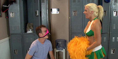 A busty blonde cheerleader is getting penetrated in the locker room