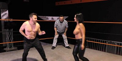 Nadia White wrestling with Glenn King in a fetish clip