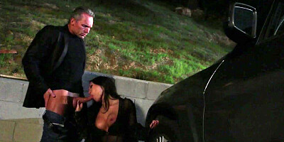 A couple is outdoors in the dark, doing a sexy fucking video