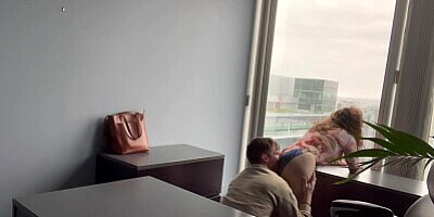 I fuck my MILF BOSS against her office window
