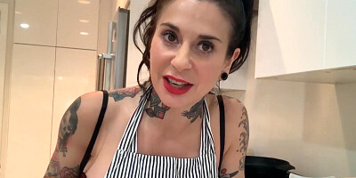 Inked minx is stuffing her itching pussy with a big black dildo