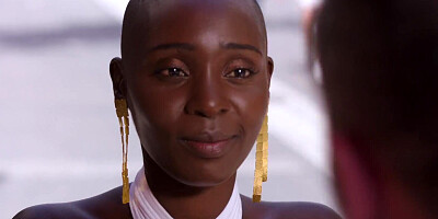 Bald black babe fucks in an interracial sex with a muscly Spaniard