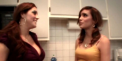 Busty MILF teaches young brunette how to cook and more