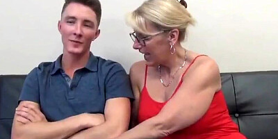 This naughty granny enjoys riding postman's con reverse cowgirl style