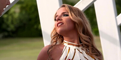 Curly girl flirts with two men who don't mind having threesome