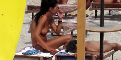 Kinky voyeur is filming some naked MILFs on a nudist beach