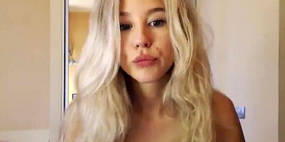 Angelic amateur blonde is teasing with her perfect curves while dressed in white lingerie