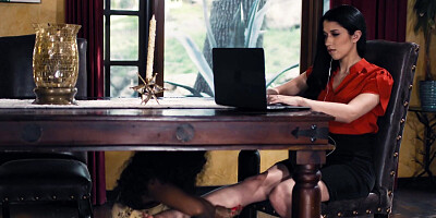 Black and white secretary are licking one another in the office