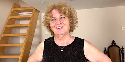 Chubby granny is playing with her black toy in this solo performance