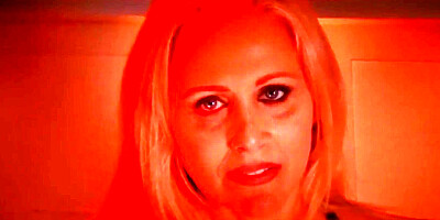 Blonde cougar Julia Ann smokes a cigar while giving a blowjob