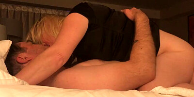 Blonde MILF kisses her man while riding his hard cock