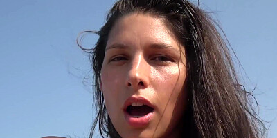 Sexy brunette exhibitionist masturbates in public at the lake