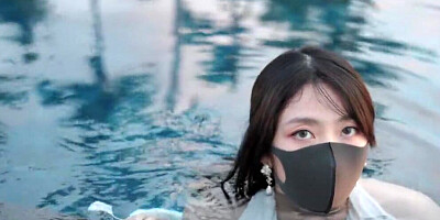 Masked Asian girl is fucking with a stranger on the beach