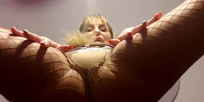 Slutty blonde mistress cock-teases and talks dirty on that couch