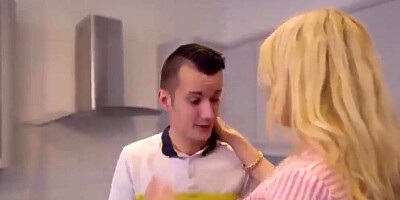 Perverted MILF polishes stepson's dick and gets fucked in the kitchen