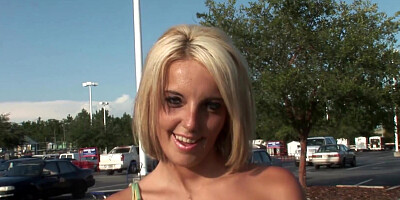 Blonde amateur with fake boobs is showing her intimate parts in public