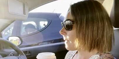 Hitchhiker MILF grabs driver's cock and blows him in the car