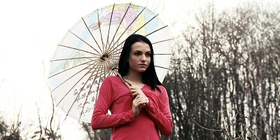 Splendid brunette masturbates pussy in the sauna