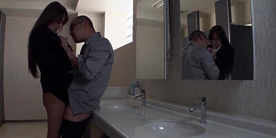 Asian office lady is sucking and jerking in the office