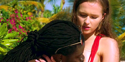 Big black man spanks Stacy Cruz while fucking her on the beach