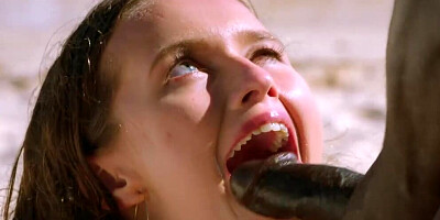 Big black man spanks Stacy Cruz while fucking her on the beach