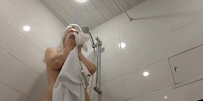 Your hot exhibitionist stepmom doesn't close the door when she takes a shower and you love to jerk off to her while she