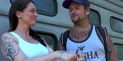 Adrienne Kiss and inked man are having sex at the picnic