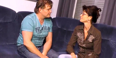 Brunette cougar sucks cock and swallows after being fucked on the couch