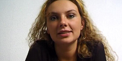 Curly-haired amateur girl is filmed while guy plays with her pussy
