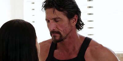 Brunette rides her partner on the kitchen floor reverse cowgirl style