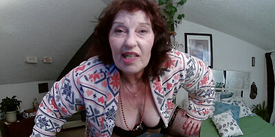 Perverted granny is playing with her muff in front of the cam