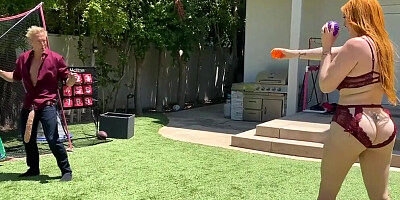 Redhead cougar sucks a massive dildo and gets poked with it