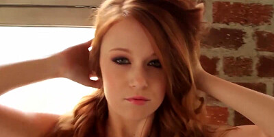 Busty redhead model Leanna Decker is a master of seduction