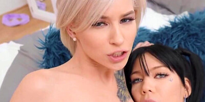 Two horny ladies are giving a blowjob together before entering the threeway sex
