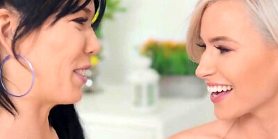 Two horny ladies are giving a blowjob together before entering the threeway sex