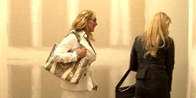 Full-bosomed blonde cougar shakes her big tits for the camera