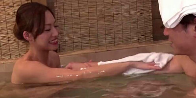 Asian MILF joins her stepson in the bath and sucks his cock