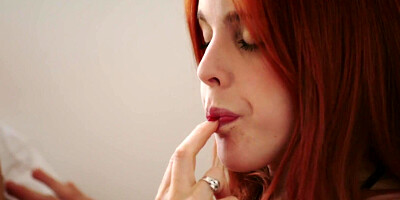 Redhead and brunette are kissing and licking one another's wet pussy