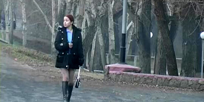 Redhead student sucks on the banks of the river for all to see