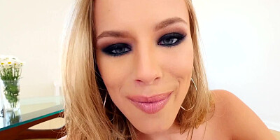 A blonde that has a nice body is pulling on a large erection