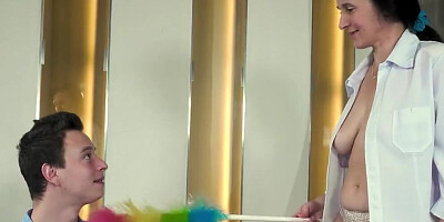 Slutty mature woman rubs her clit while being fucked on the floor