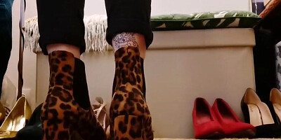 Lovers of foot fetish will enjoy an amateur lady trying on various shoes