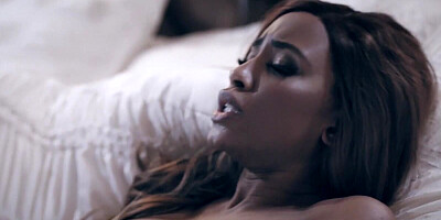 Passionate kissing turns into a lustful interracial pussy eating between two hot lezzies